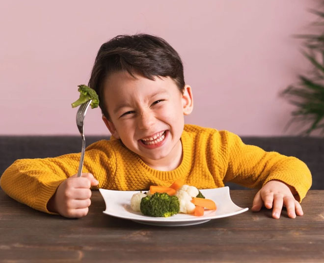 child eating healthy inside