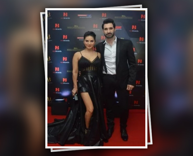 sunny leone in thigh slit black dress with daniel weber inside