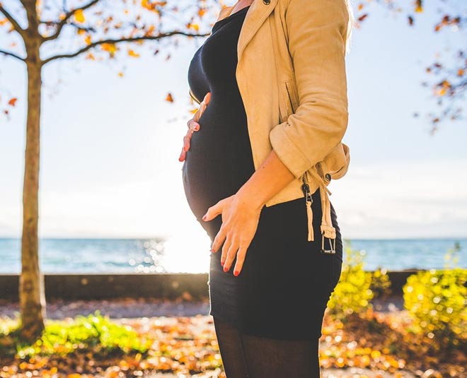 pregnant woman standing