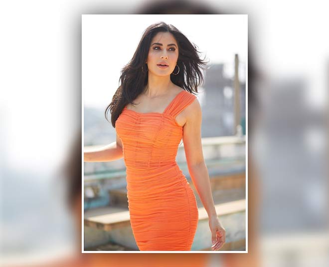actresses orange short dress looks inside