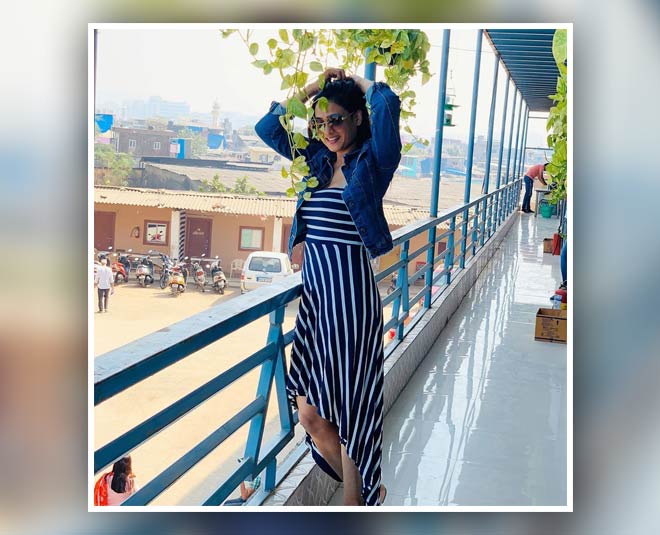 actresses in blue dress inside