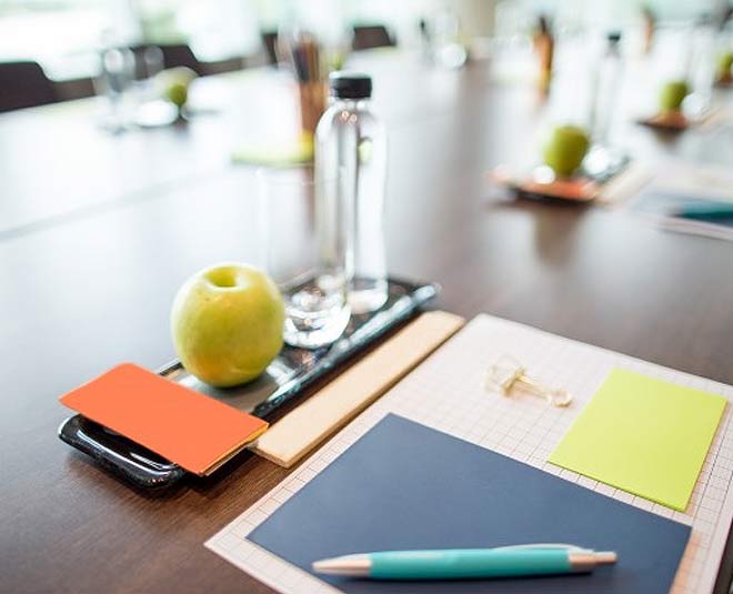 work space with laptop water bottle inside