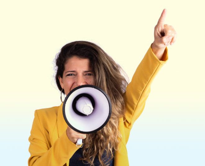woman screaming megaphone inside