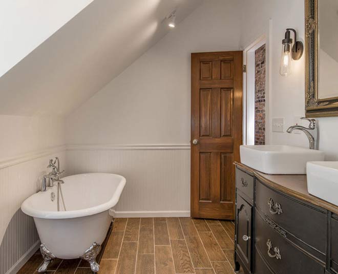 bathroom door gets damaged from water inside