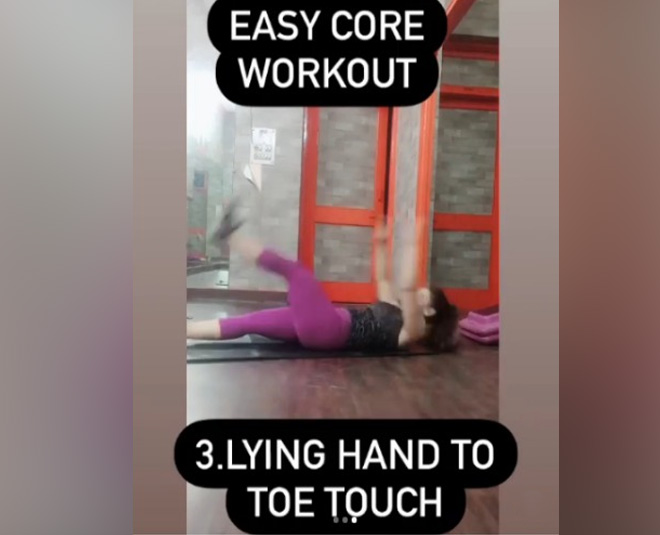 lying hand to toe touch inside