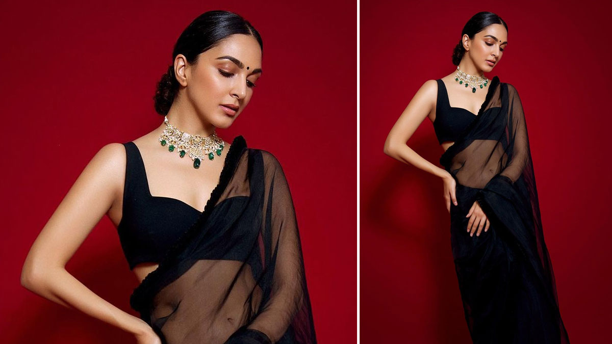 black saree with sleeveless blouse