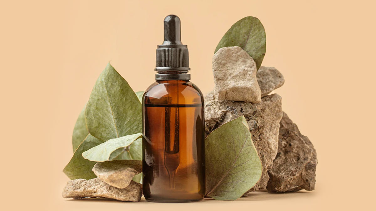 how to massage head with tea tree oil