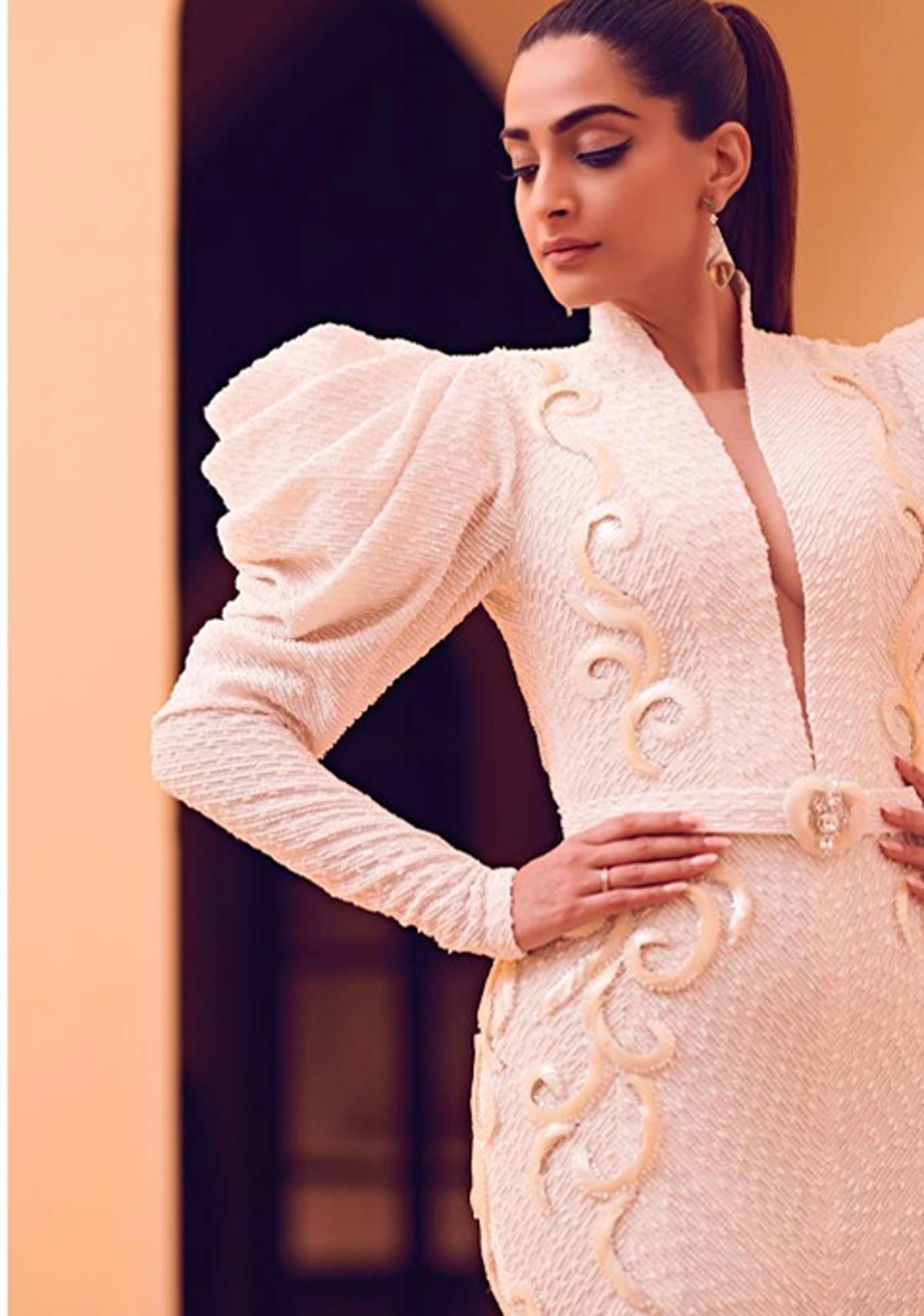 Deep v gown with stylist belt