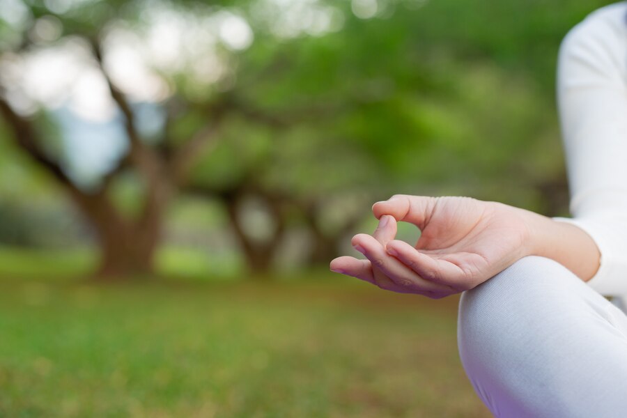 women are playing yoga park