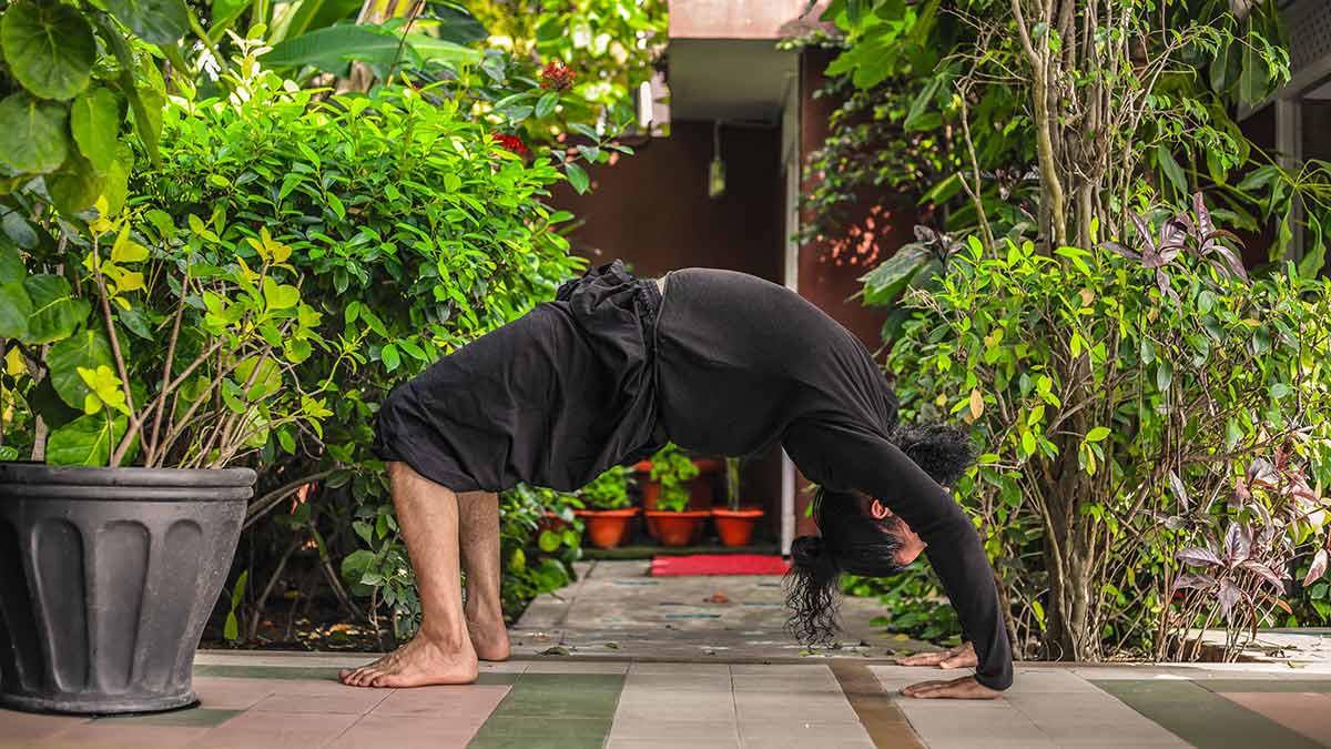 Chakrasana for flat stomach