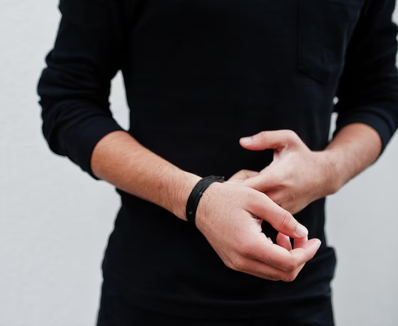 black thrread in hand