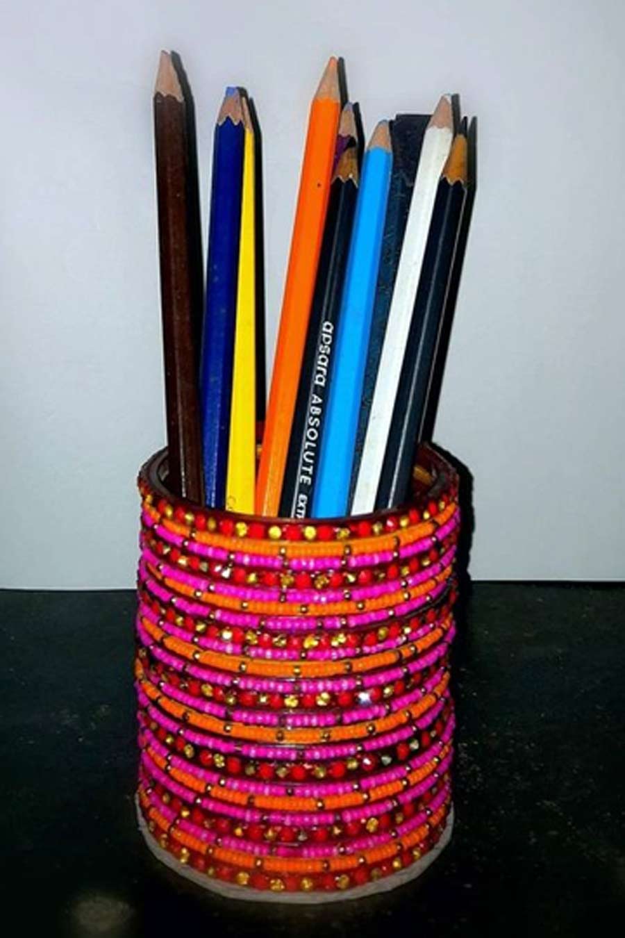 old bangle pen holder