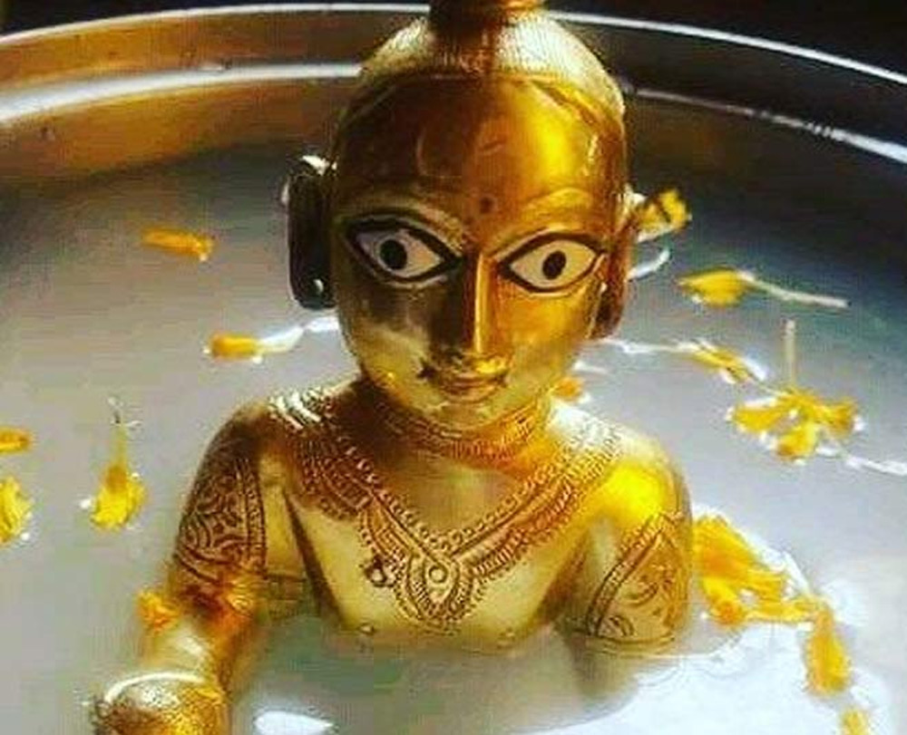 what to do with charnamrit of laddu gopal