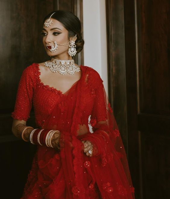 Silver Contrast Jewellery With Red Lehenga