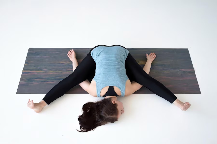 kurmasana yoga pose
