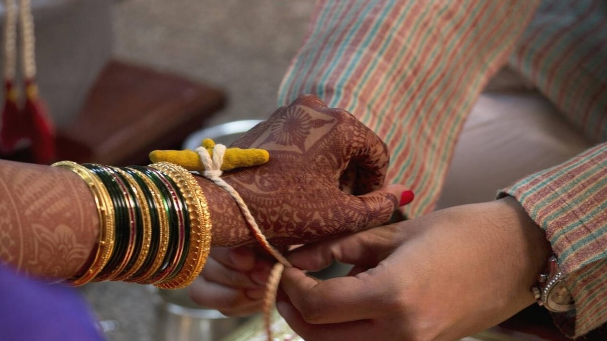 why turmeric tied to bride