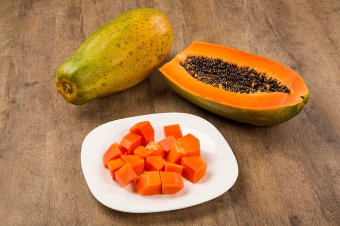 How can I use papaya for glowing skin in hindi
