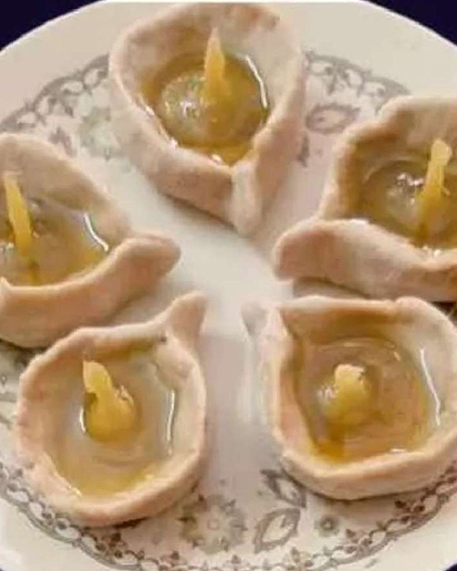 What is the significance of diya in pooja