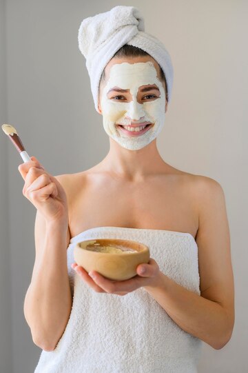 happy woman wearing face mask holding bowl