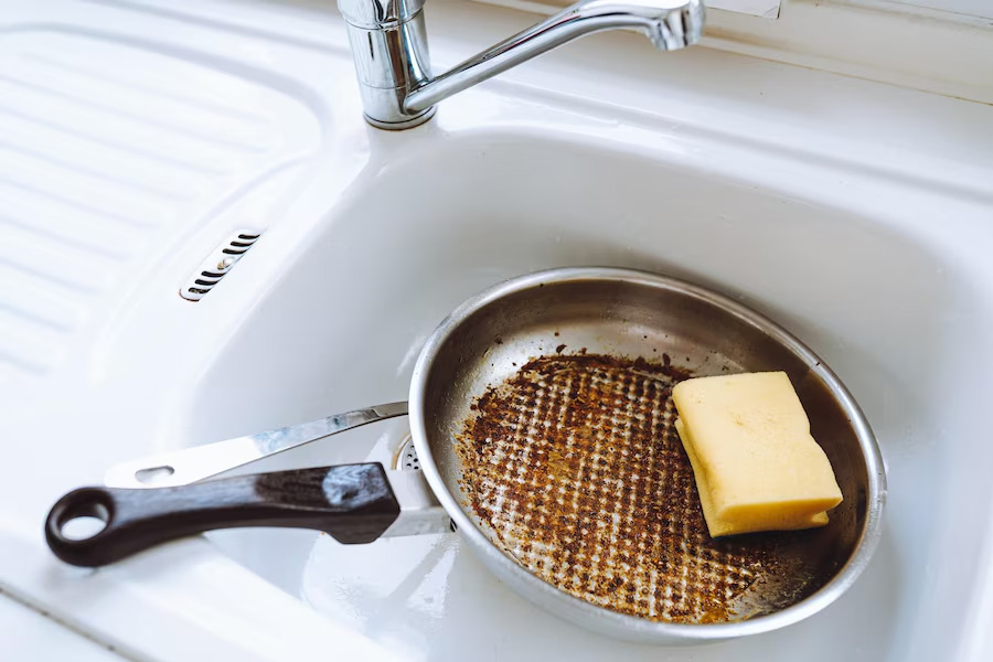 how to clean burnt pan with flour