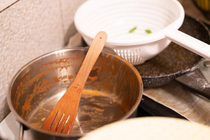 how to clean sticky oily utensils