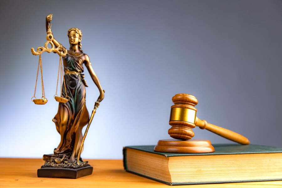 Who is the woman in the Statue of justice