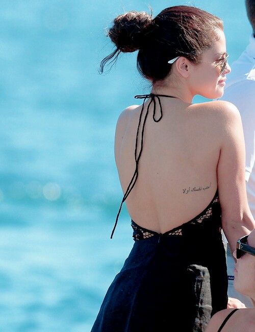 side back hidden tattoo