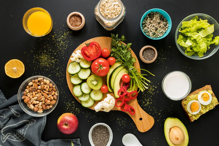 top view ingredients dryfruits vegetables black background
