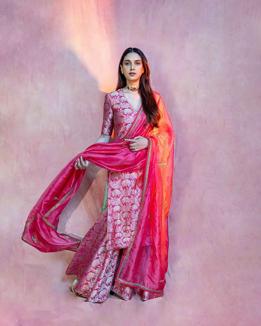 Aditi Rao @aditiraohydari wears Raw Mango Chorus, featuring silk brocades in vibrant notes of Sharbati and Lime. Seen here, Judith Varanasi silk brocade kurta, Mara sharara and Kanad Odhani in sharbati. At