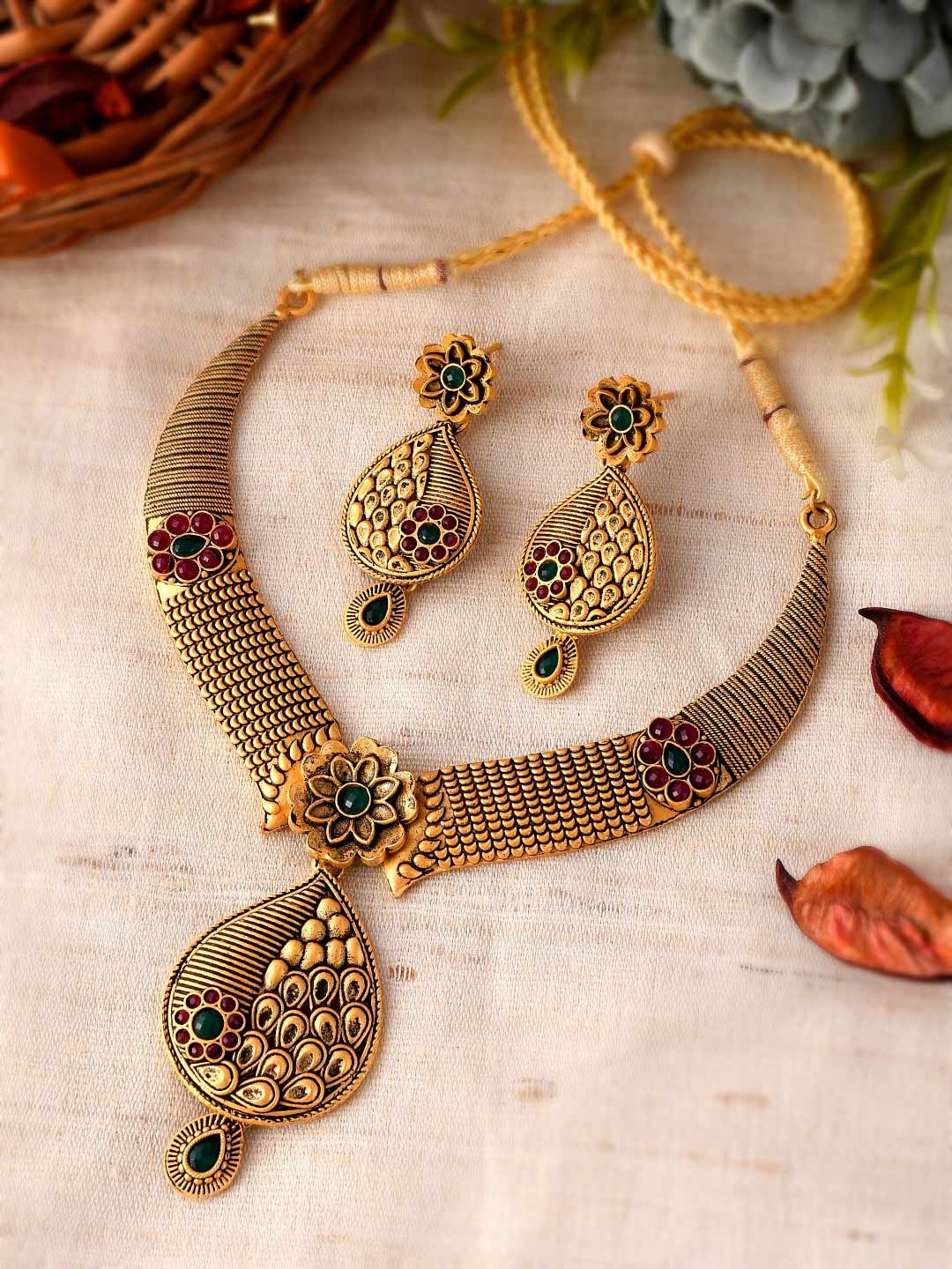 Gold Red And Green Stone Studded Jewellery Set