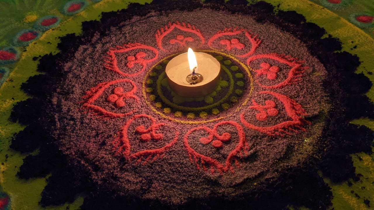 Rangoli Around Diya Design For Diwali 2024