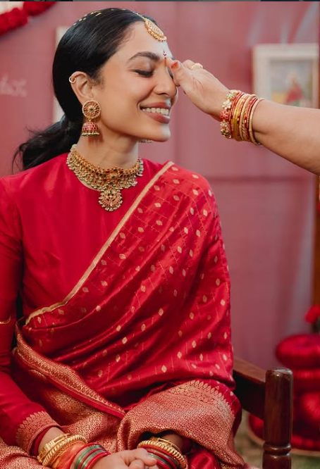 sobhita being blessed by elders