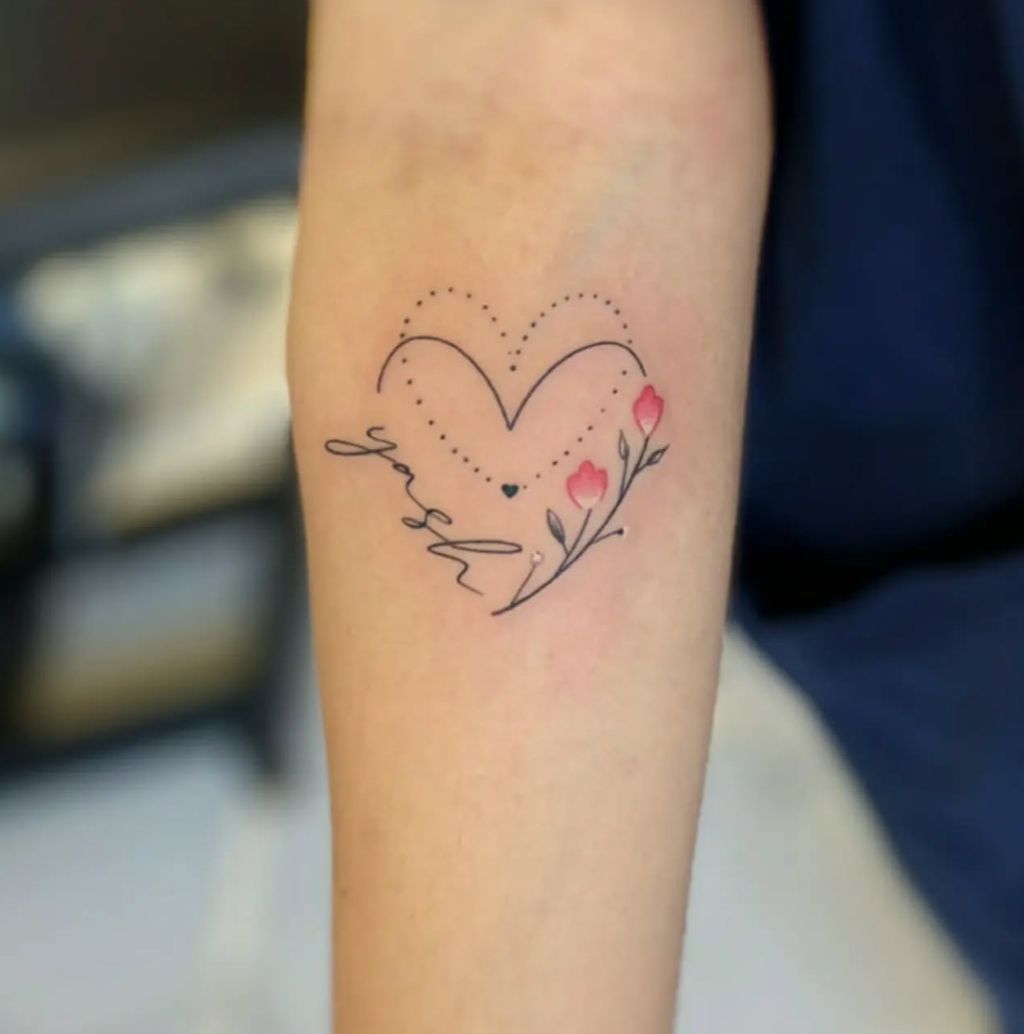 Heart with name and flowers tattoo