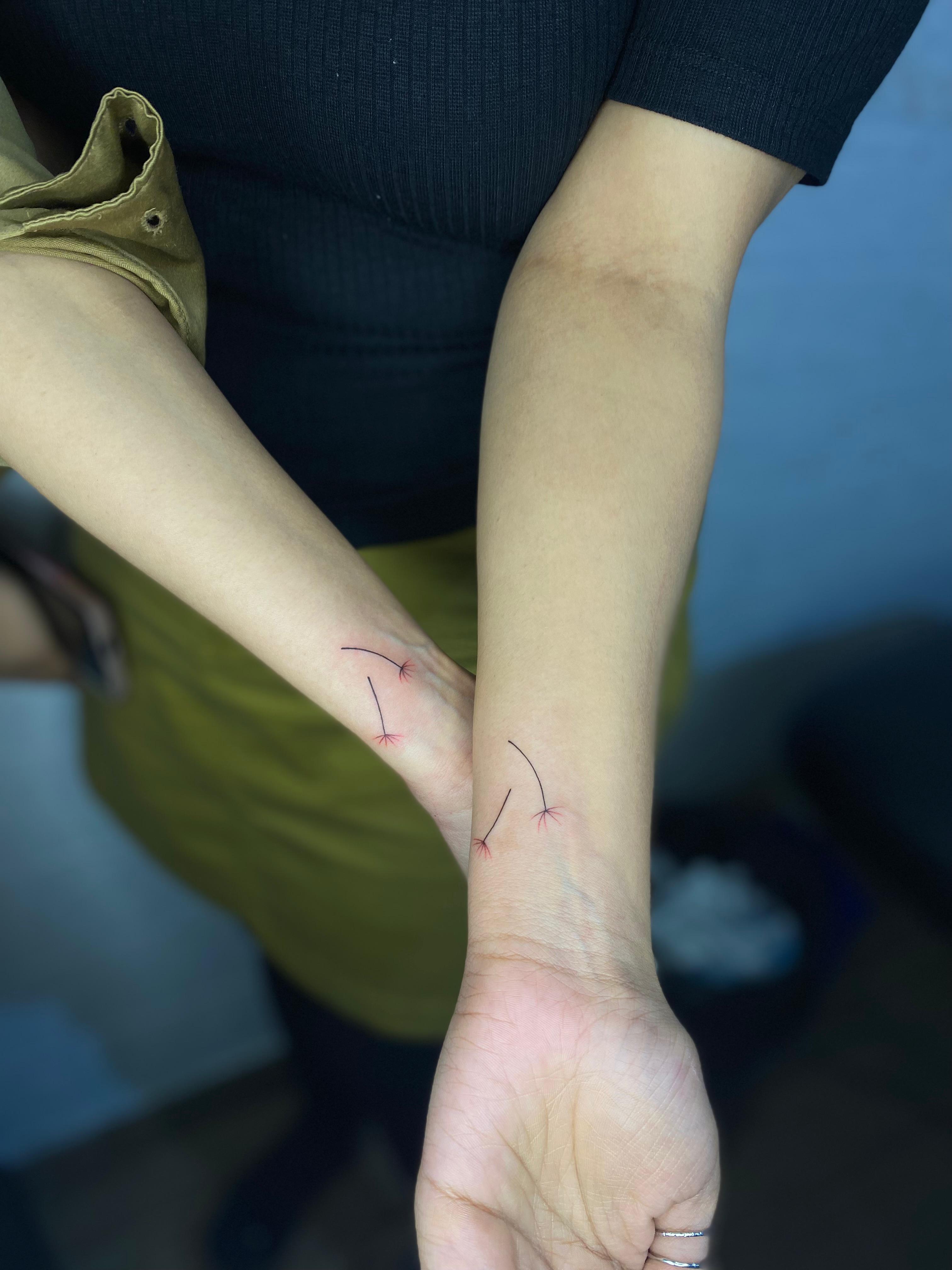 Minimal Flowers Couple tattoo Design