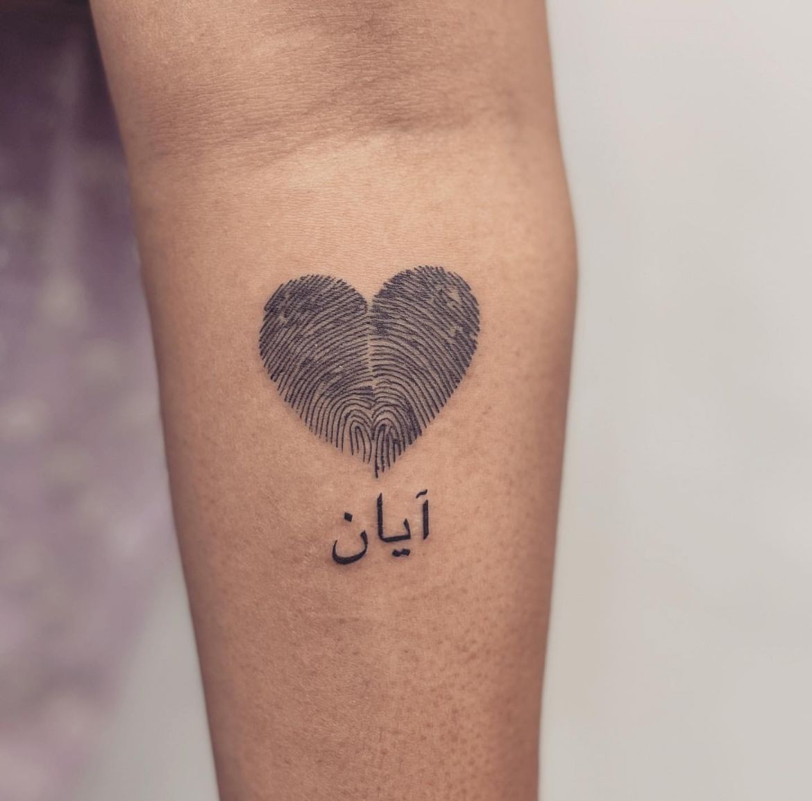 intertwined Fingerprints heart tattoo design