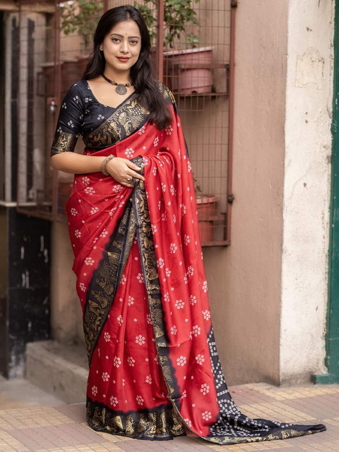 Red Bandhani Saree With Black Contrast Blouse