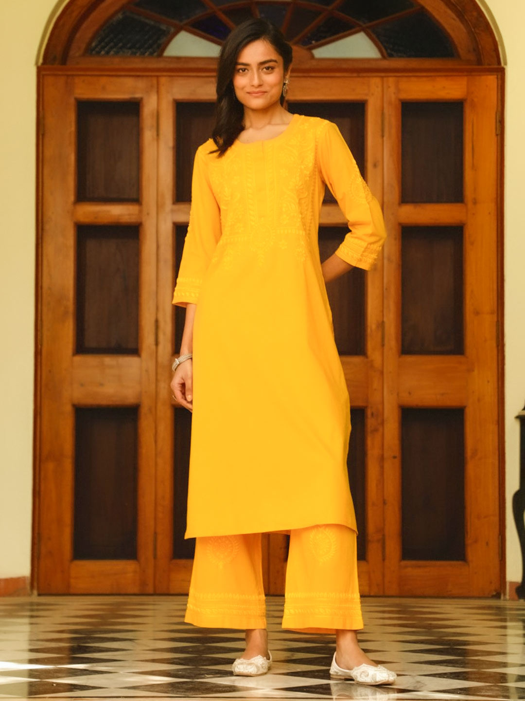Plain Yellow Chikankari Kurti Design