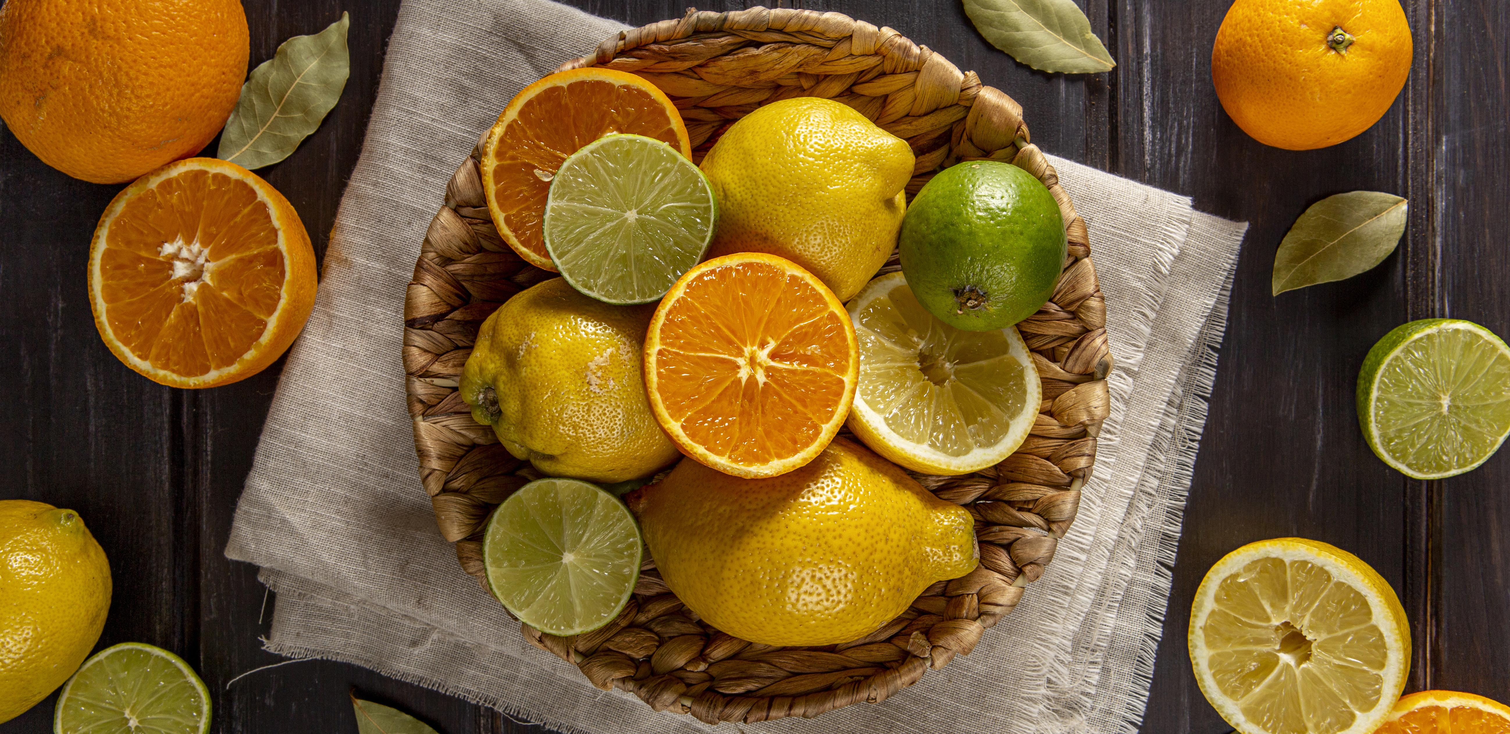 top-view-basket-oranges-limes