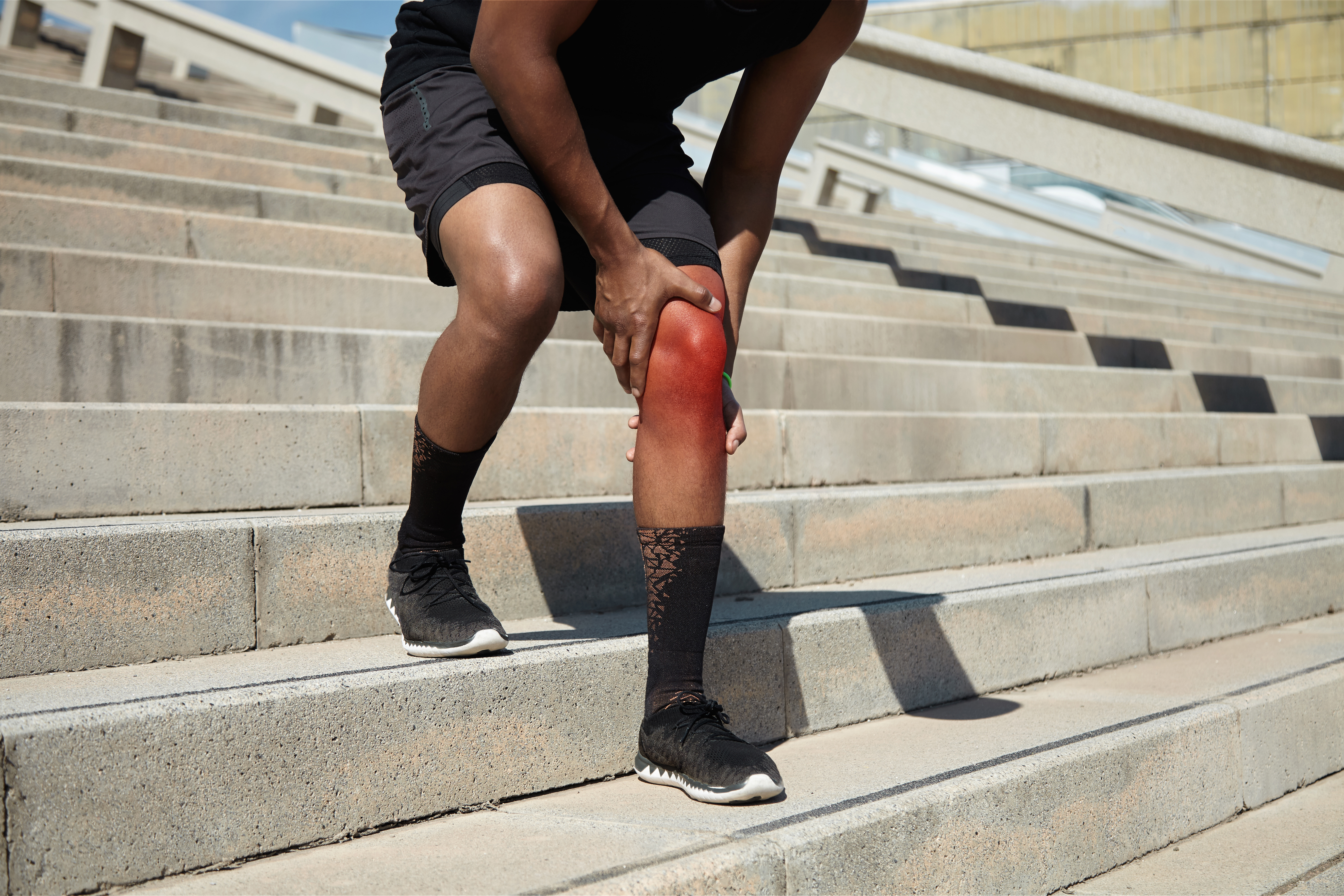 closeup-young-man-with-knee-injury