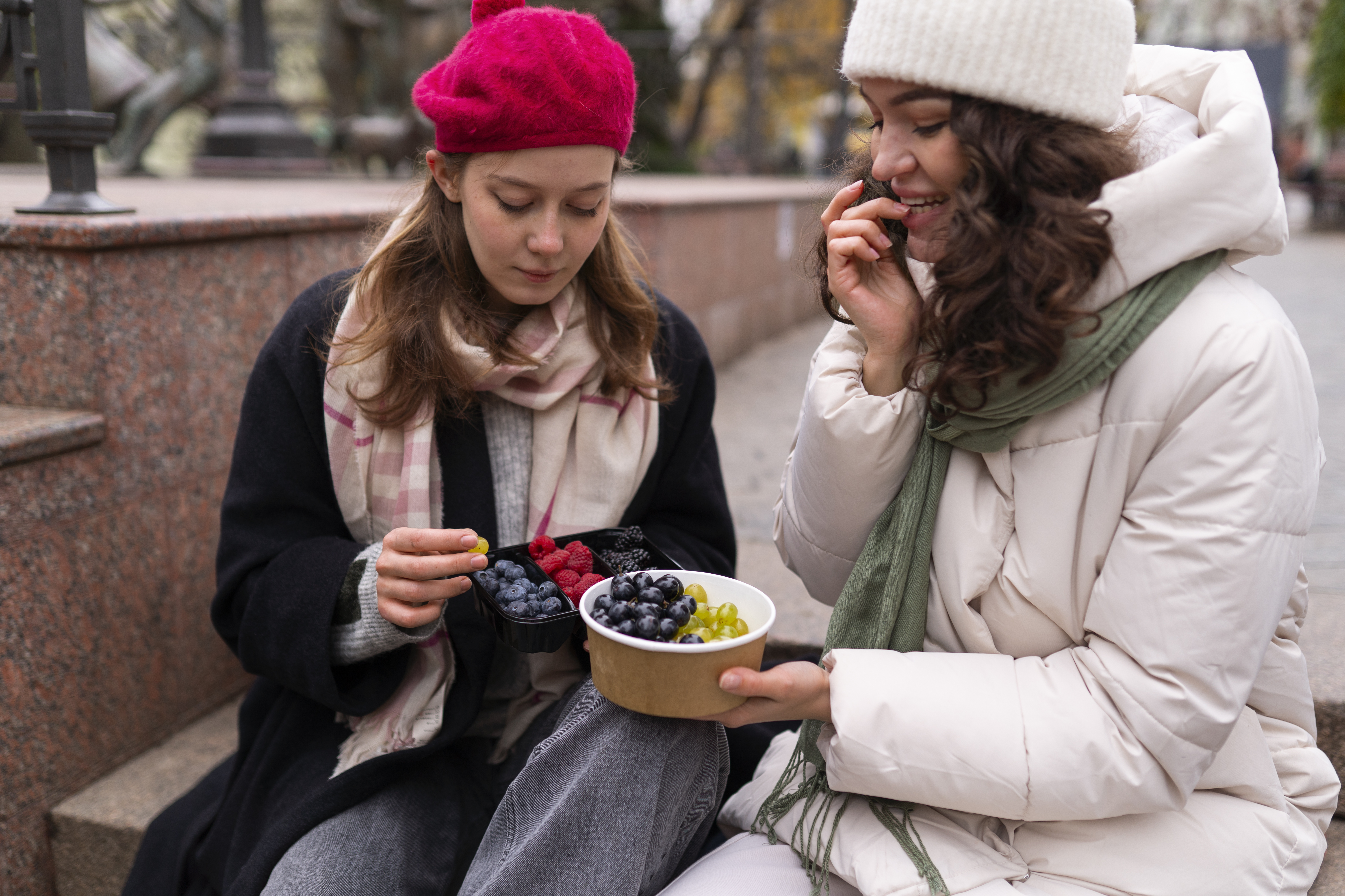 medium-shot-women-with-berries-outdoors