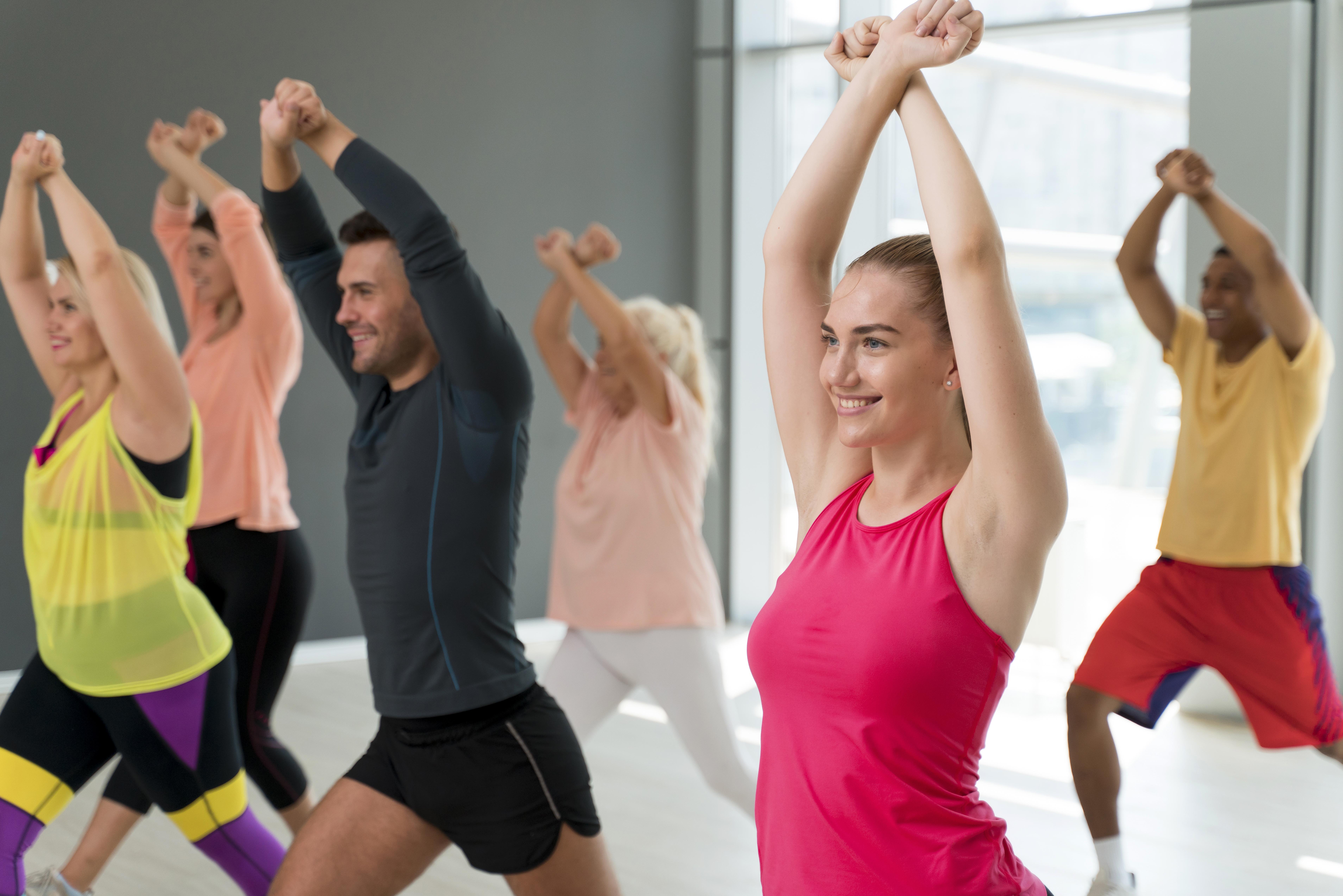 smiley-people-having-fun-zumba-class