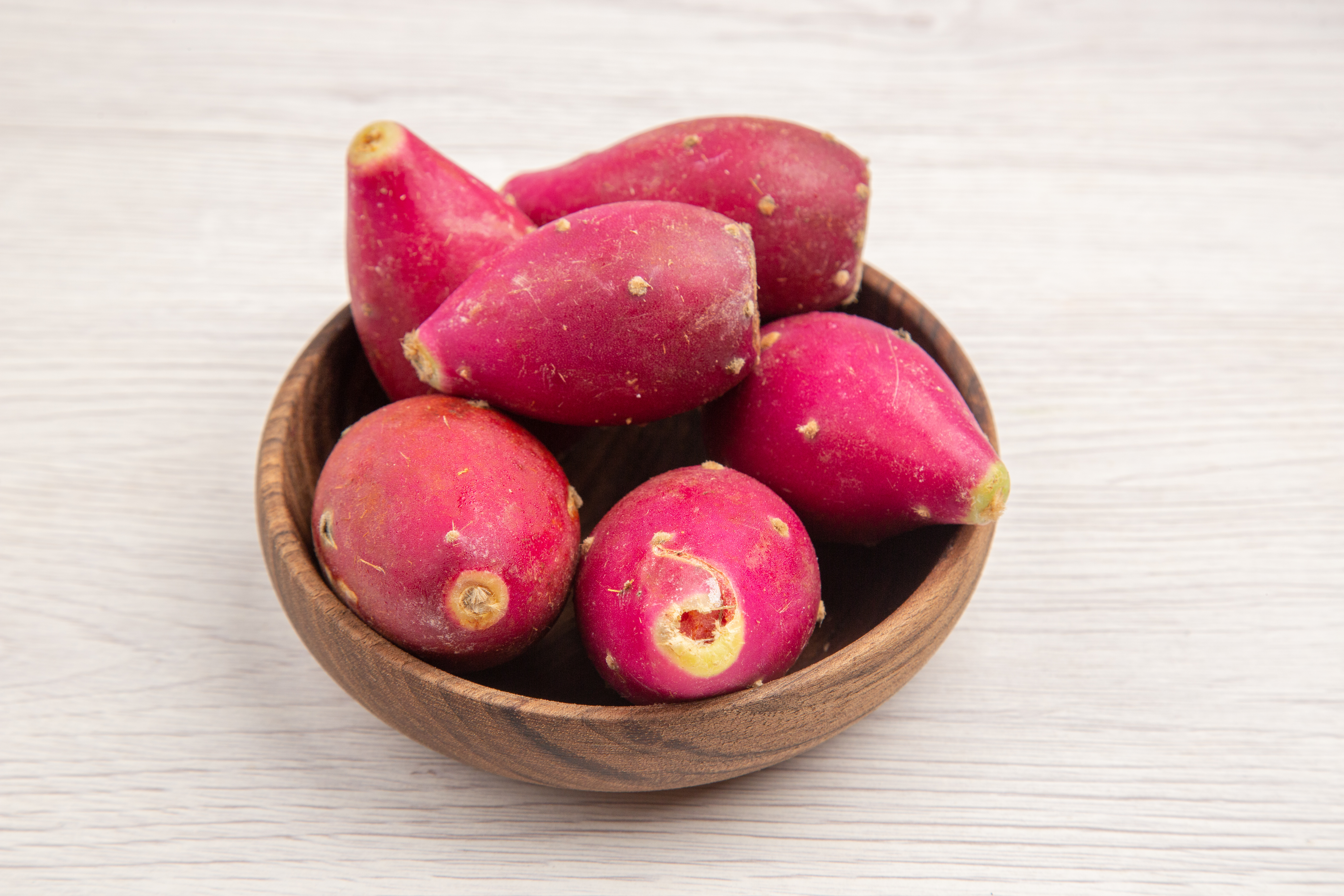 front-view-purple-fruits-inside-plate-white-background-fruit-color-exotic-photo-tropical