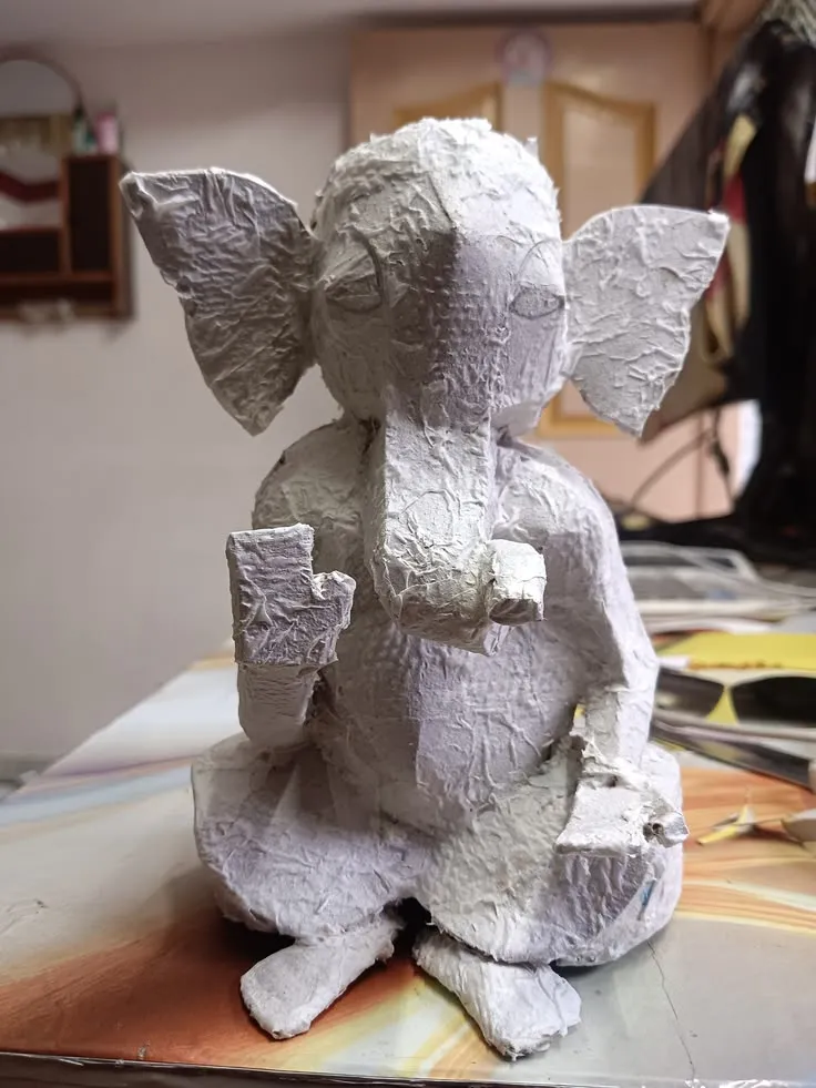 paper mache idol