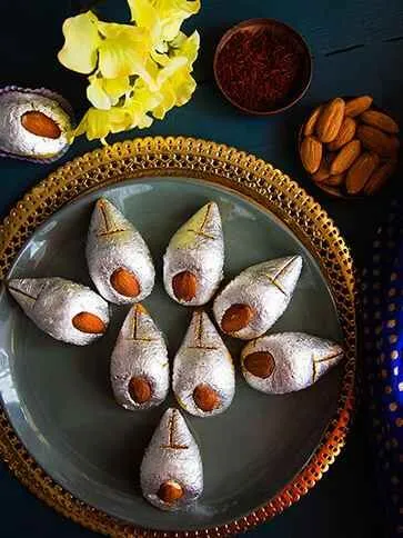 silver work on mithai