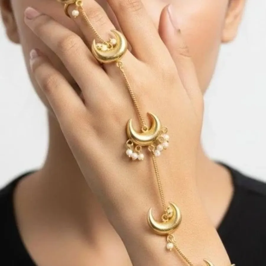 Yes. Most of these trends are lightweight and versatile. Opt for smaller ear chains, dainty bracelet watches, and minimal pearls for daytime functions, and go for heavier, embellished versions fo (3)