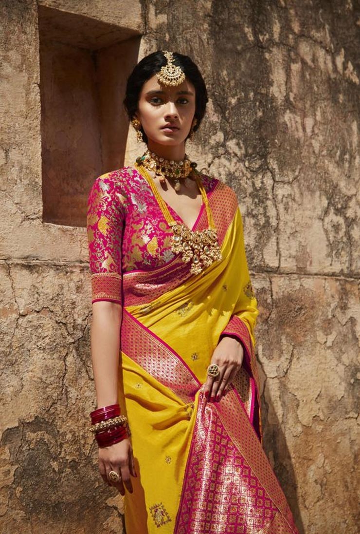 yellow saree style with pink blouse