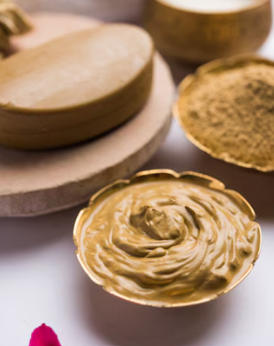 ayurvedic-face-pack-mask-using-gram-flour-besan-haldi-ubtan-placed-bowls-scrub_1139585-13215