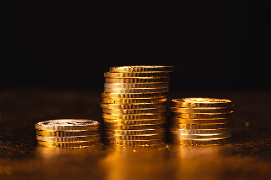 is better to invest in gold coin or bars