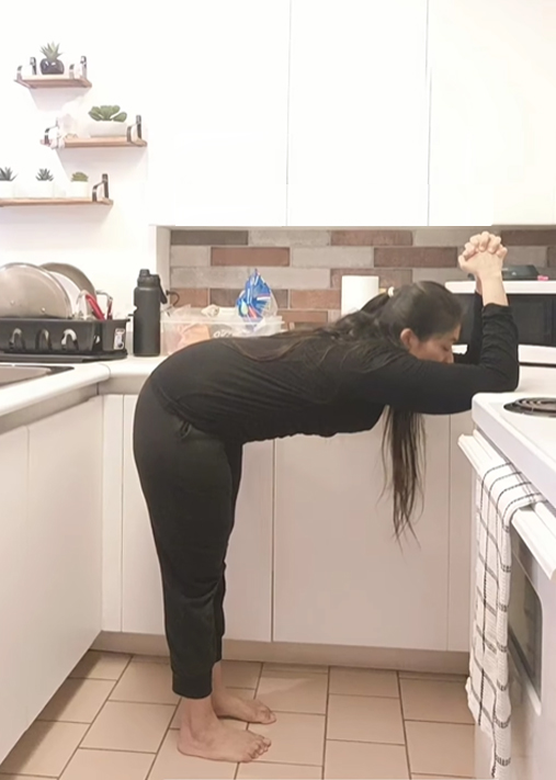 puppy pose in kitchen