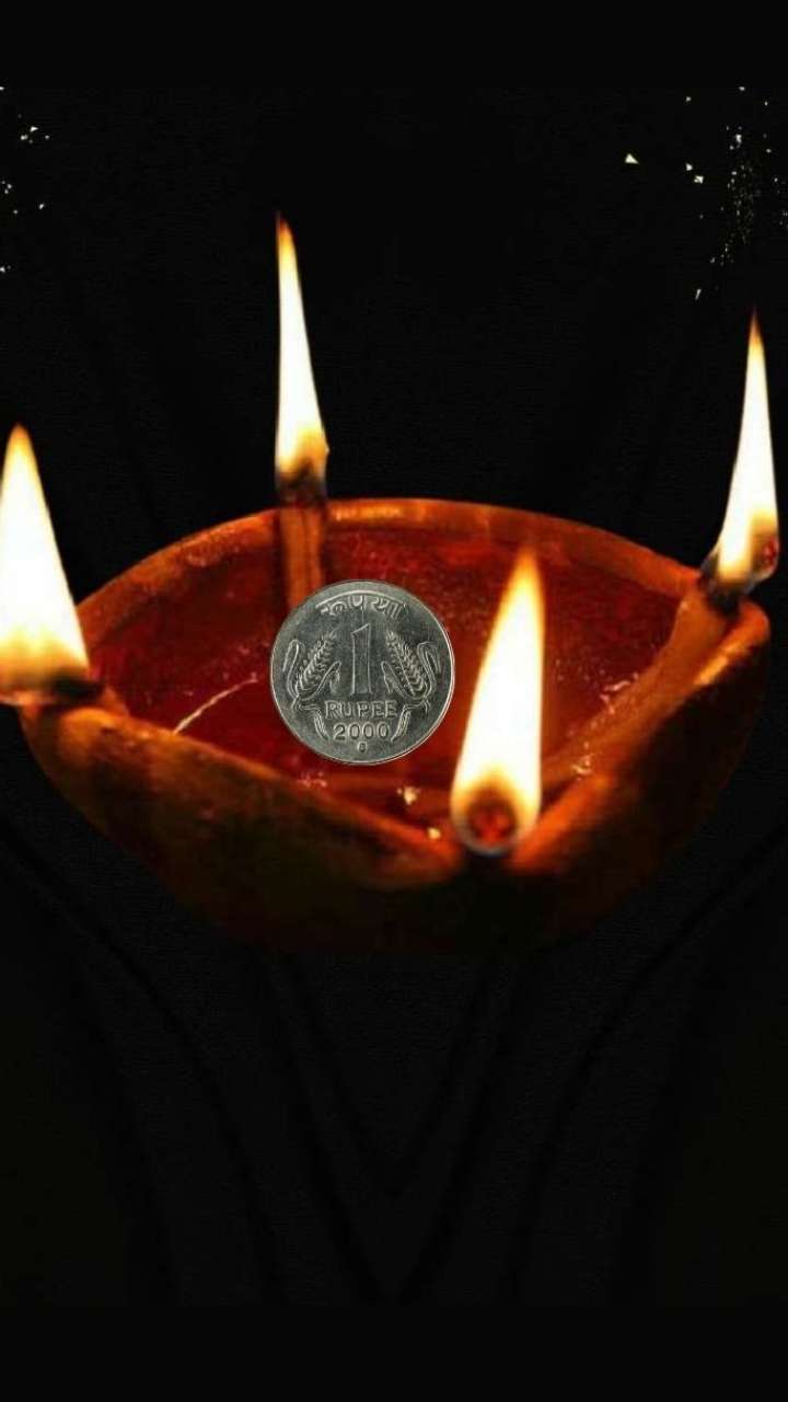 diwali ke diya mein 1 ka sikka kyu dalna chahiye